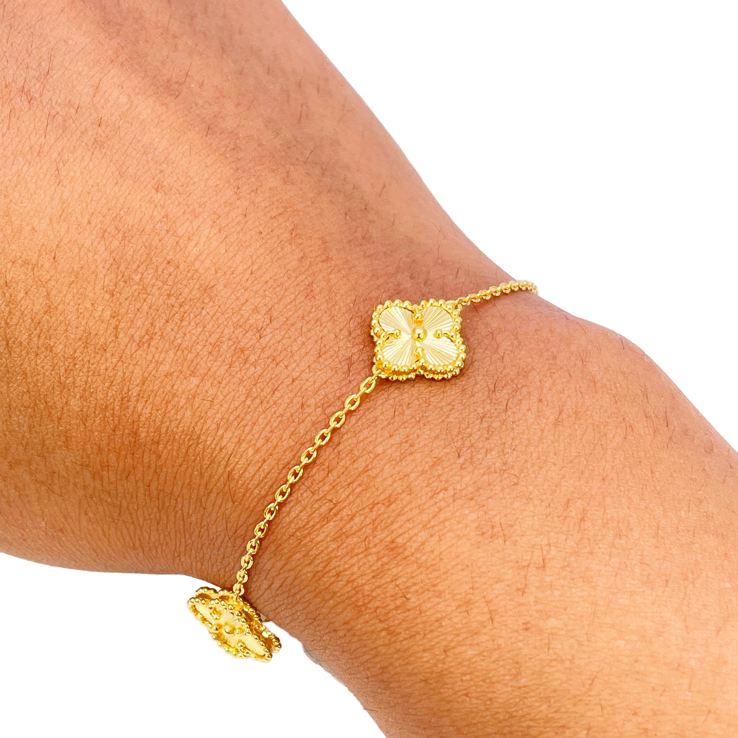 Bracelet 7,5 pouces en or jaune 22 carats avec 5 trèfles floraux taillés en diamant